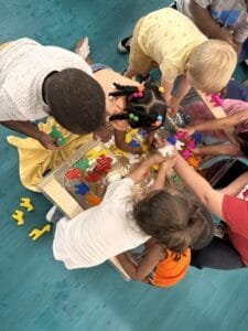 Sensory - Paige Sensory bin with children.