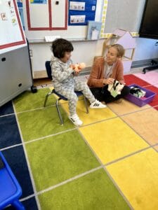 IMG_3139 Teacher with student for show and tell.